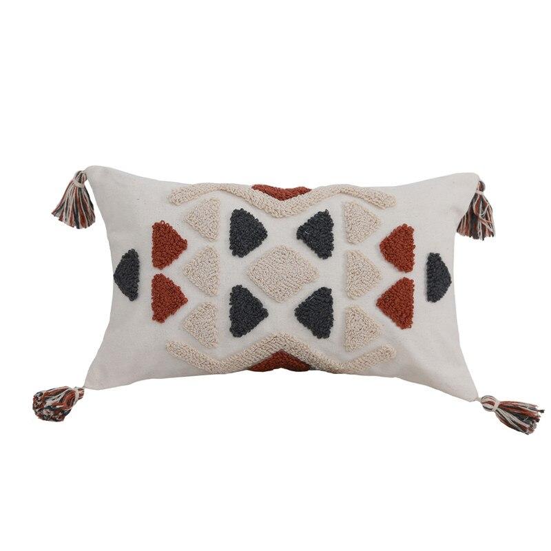 Artisanal Azilal pillow: Handwoven with wool and adorned with traditional motifs, this meticulously crafted pillow is a testament to the skilled artisans who have preserved Berber weaving techniques for generations. Its unique pattern and textured surface make it a captivating accent piece for any room.
