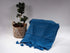 Moroccan Berber blue Pom Pom Blanket: Cultural treasure. The Moroccan Berber Handmade Pom Pom Blanket is a cherished piece that represents the rich cultural heritage and traditions of the Berber people in Morocco.