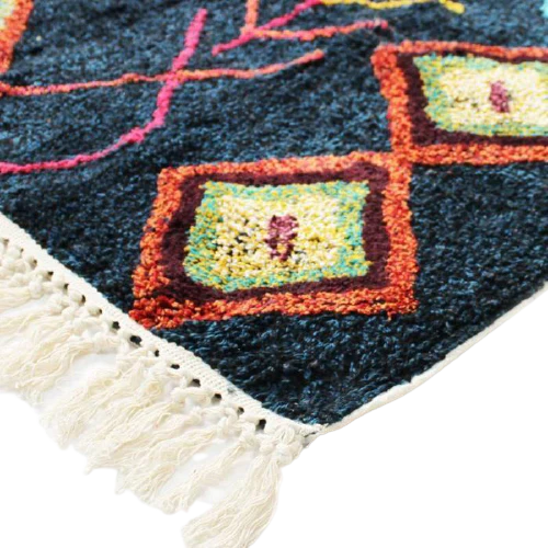 Enchanting Moroccan beauty: Immerse yourself in the captivating allure of Moroccan culture with the Berber Handmade Navy Blue Azilal Carpet, a mesmerizing piece of artistry that brings the magic of Morocco into your home.